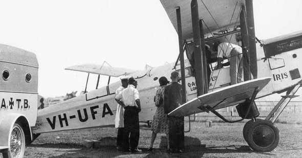 A group of people standing next to an airplane

AI-generated content may be incorrect.